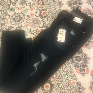 EXPRESS Mid Rise Ripped Stretch Jean Leggings